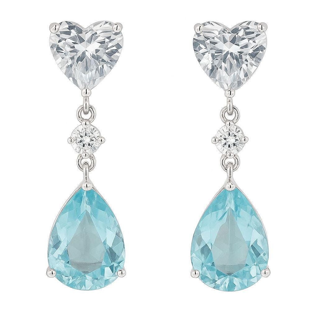 Pair of earrings with heart-shaped top and teardrop-shaped bottom on a white background