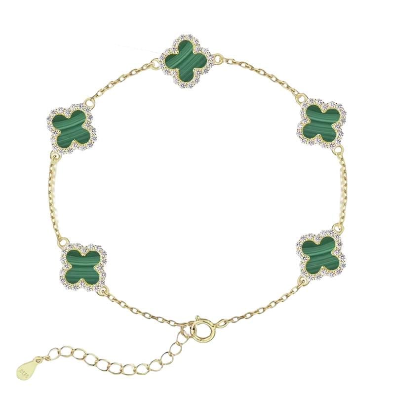 Gold bracelet with 5 malachite clovers charms on a white background