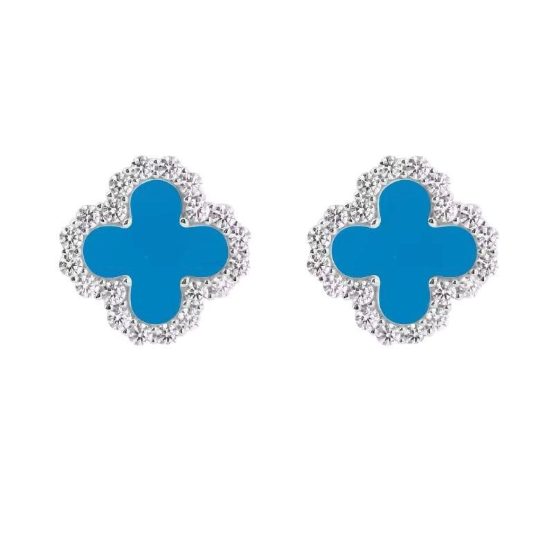 blue topaz clover earrings on a white background - Ali & Eve Jewels