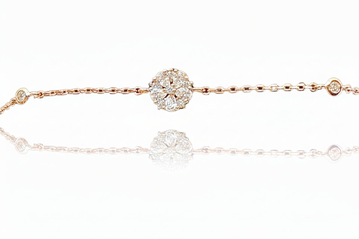 Gold bracelet with diamond accents on a white background  - Ali & Eve Jewels