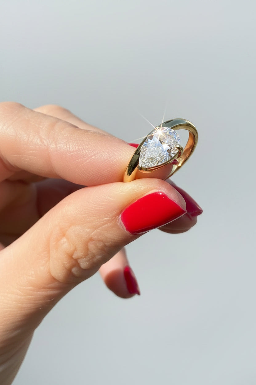 Moissanite Pear Cut Sideways Ring