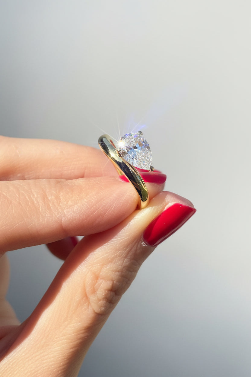 Moissanite Pear Cut Sideways Ring