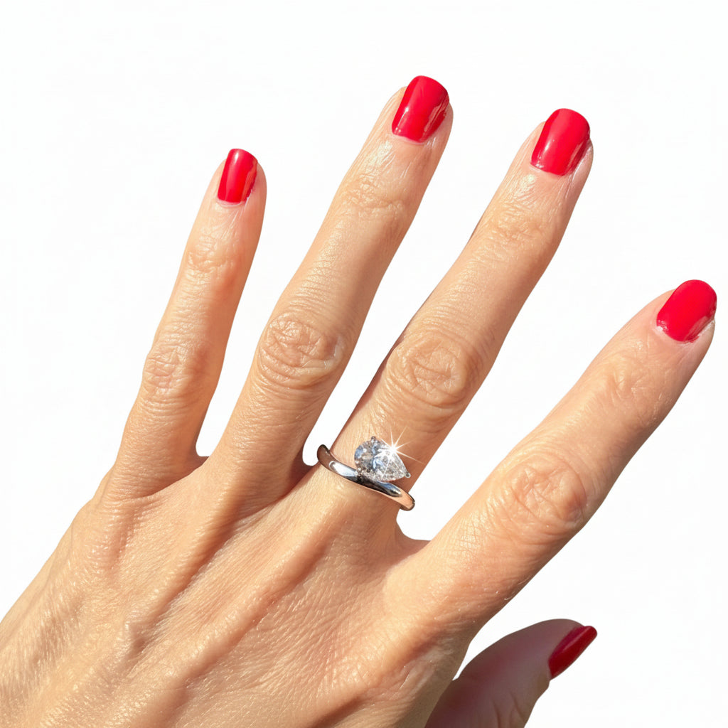Moissanite Pear Cut Sideways Ring