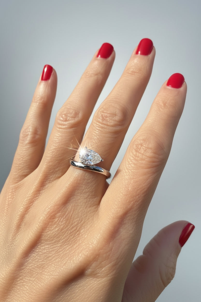 Moissanite Pear Cut Sideways Ring
