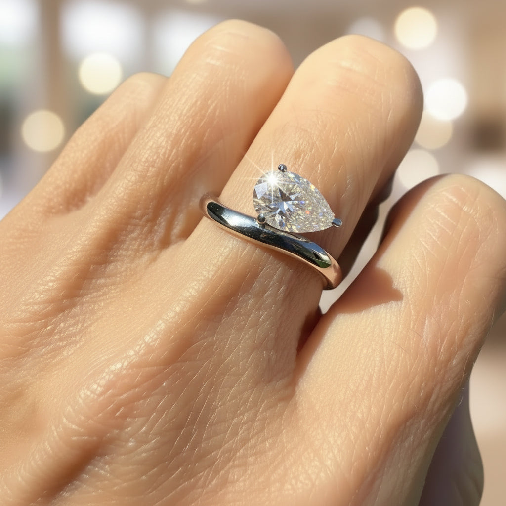 Moissanite Pear Cut Sideways Ring