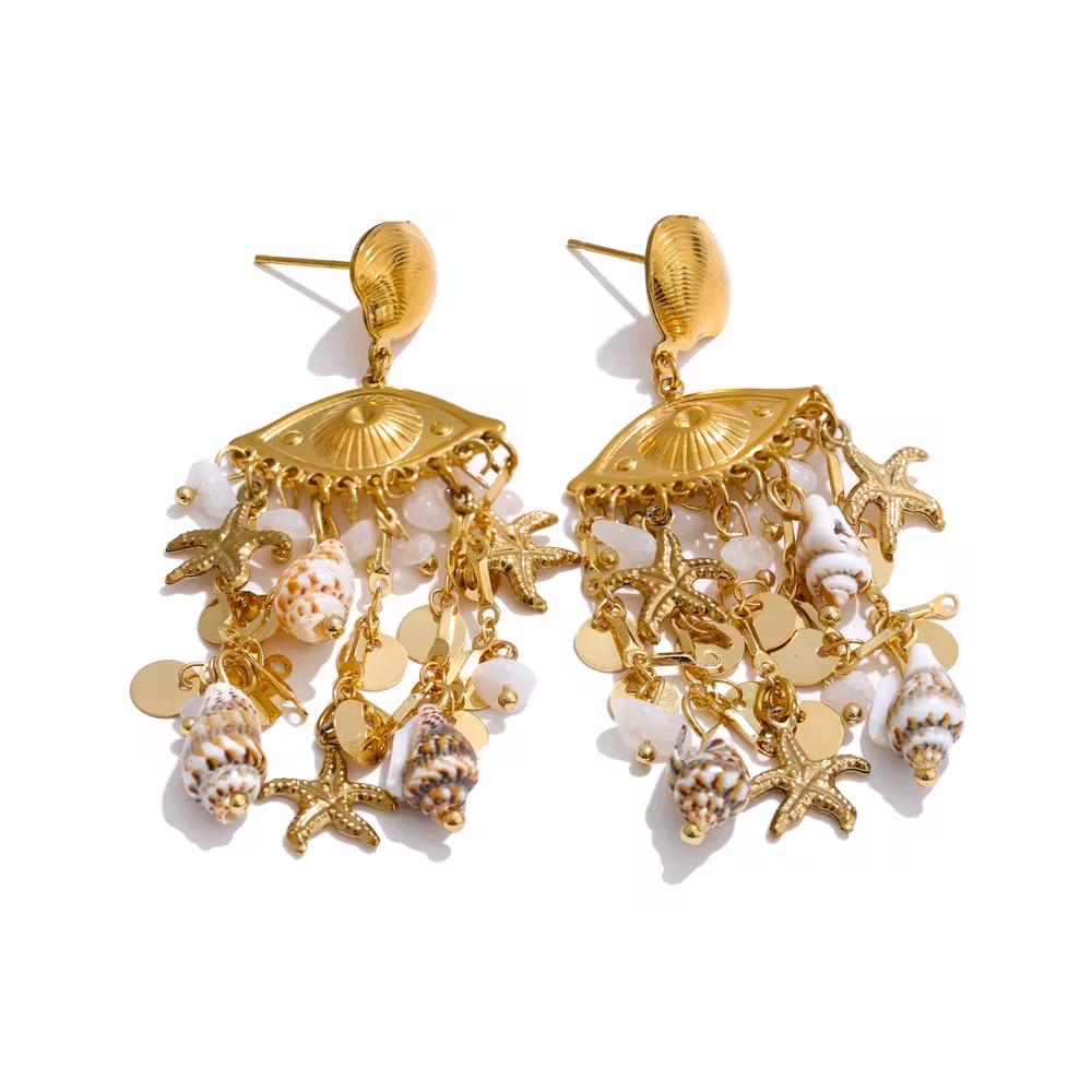 Gold and white chandelier earrings on a white background  - Ali & Eve Jewels
