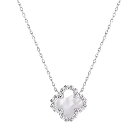 Van Cleef & Arpels white gold necklace showcasing an iconic Alhambra clover pendant with an iridescent white mother-of-pearl center and a sparkling pavé diamond border on a delicate cable chain
